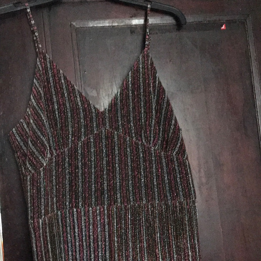 34.  Brand new metallic, multicolored semi-sheer jumpsuit.